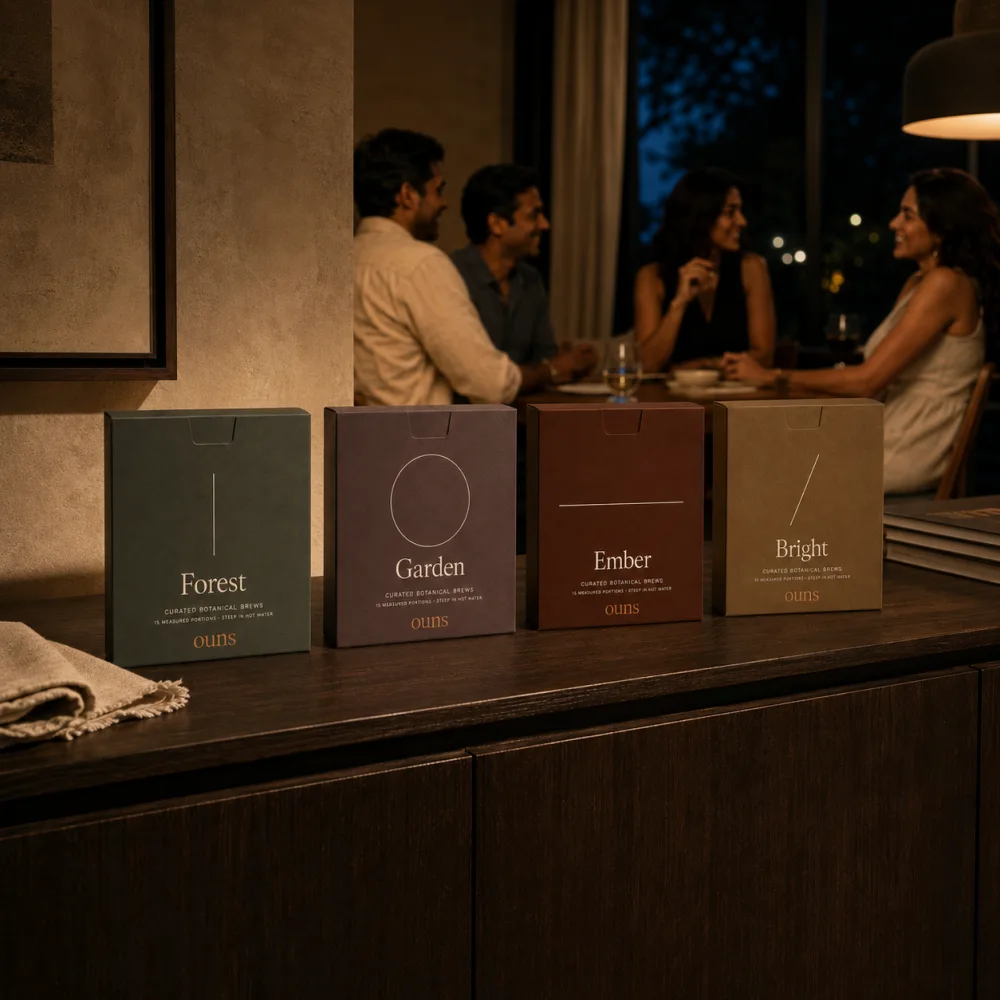 Friends sharing an evening at home with the ouns collection on the table
